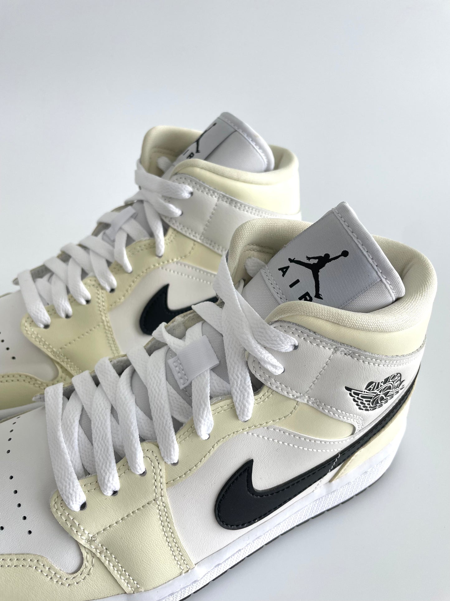 Jordan 1 Mid “Coconut Milk” (W)