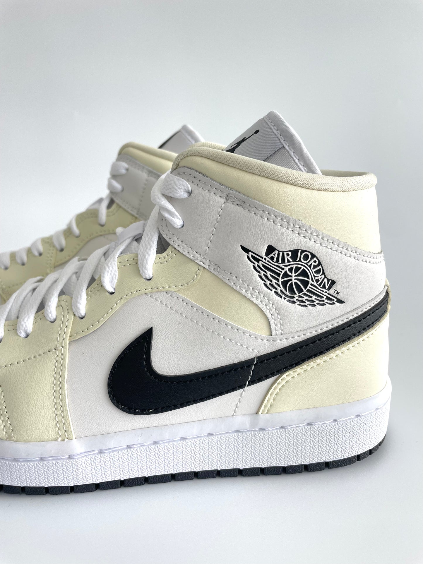 Jordan 1 Mid “Coconut Milk” (W)