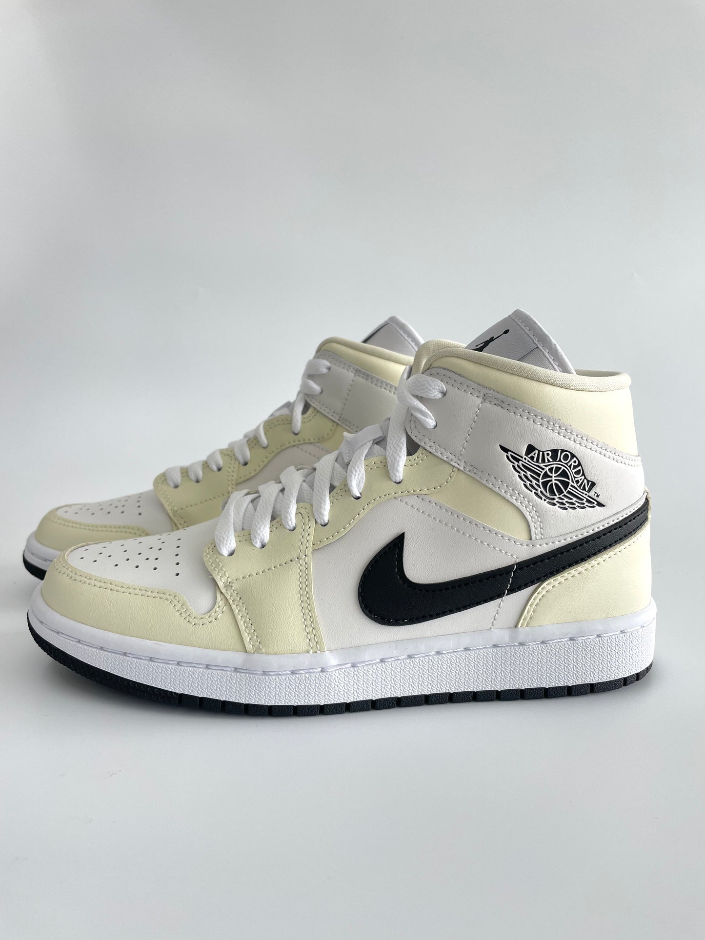 Jordan 1 Mid “Coconut Milk” (W)